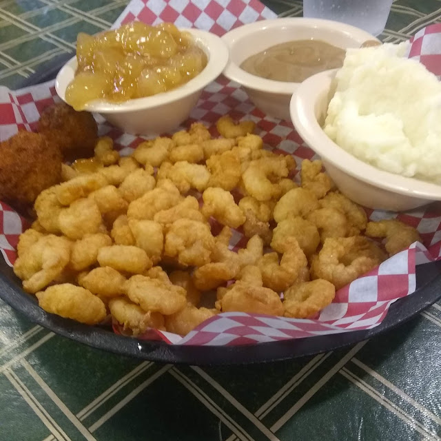 Hush Puppies Popcorn Shrimp Basket with Mashed Potatoes and Gravy Plus Fried Apple's