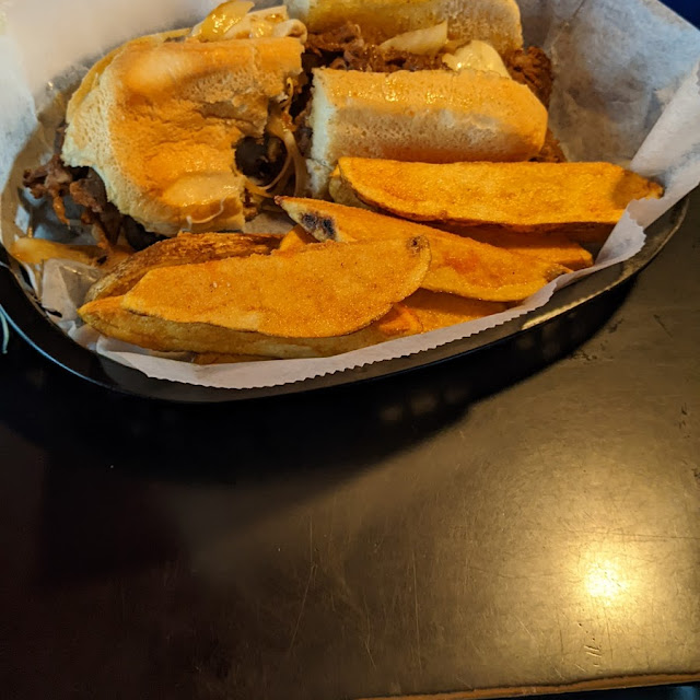 Steak Philly Cheese Steak Sandwich and Taters