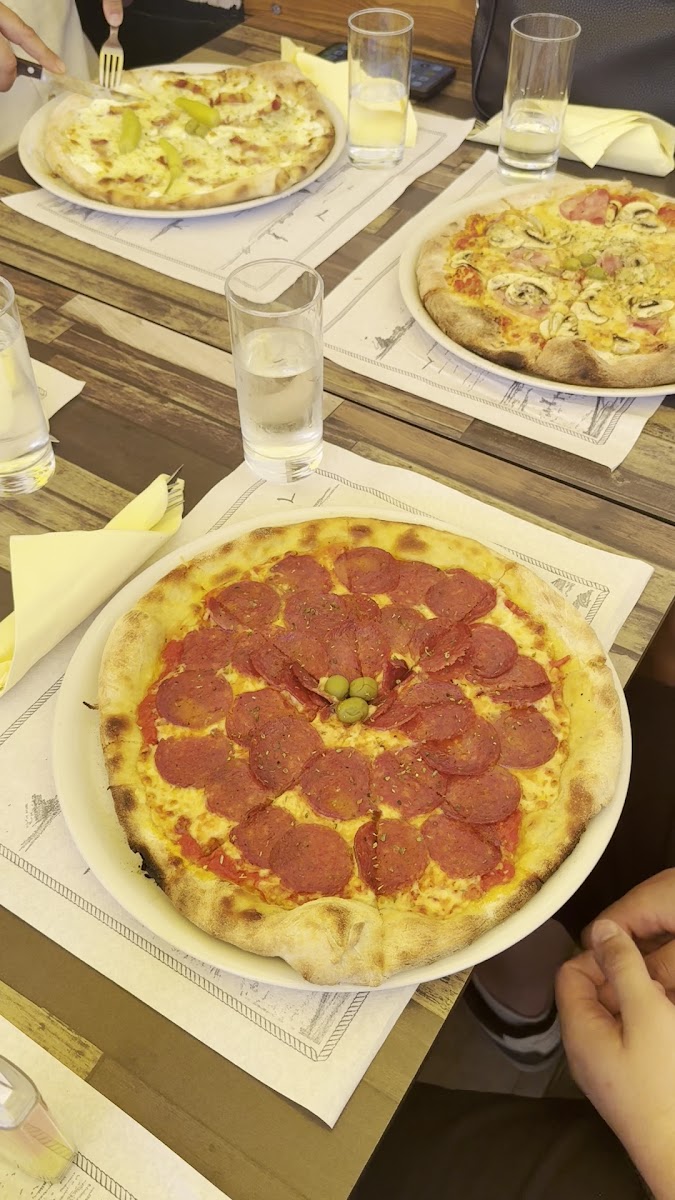 Pizzeria Tomato - Photo 1