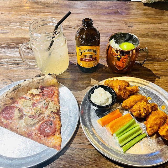 Meat Lover’S Pizza Buffalo Wings Ginger Beer and Moscow Mule