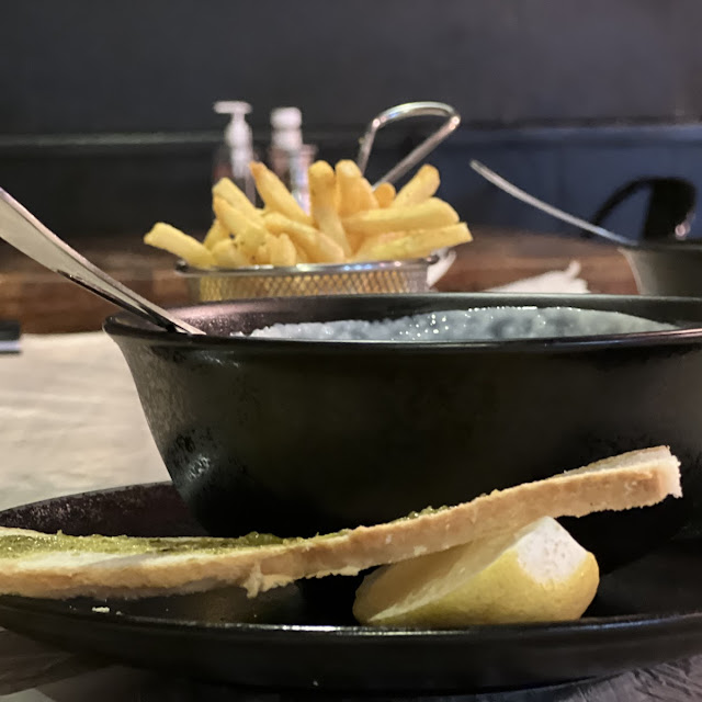 French Fries with Seafood Soup