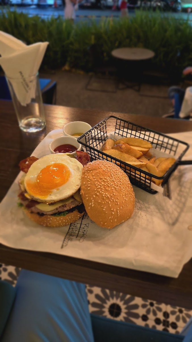 The Mani Bar and Grill - Photo 5