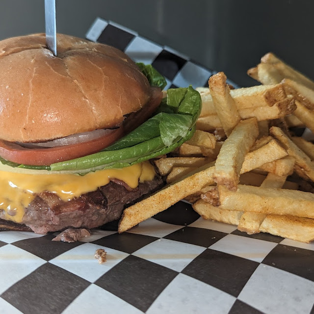 Cheese Burger You Choose Your Toppings Mine Has Swiss Cheese and Mushrooms and Grilled Onions