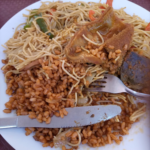 Ofada Jollof Rice with Spaghetti and Moimoi