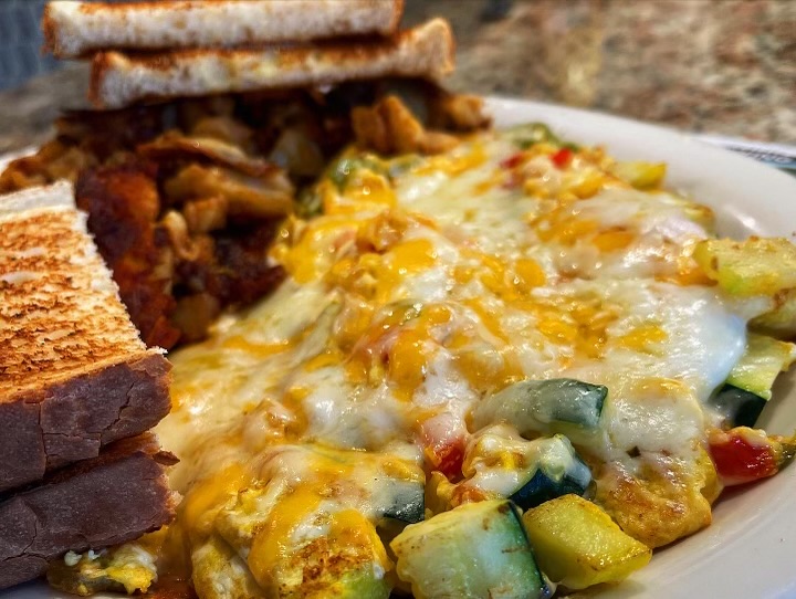 The Cracked Egg Cafe - Photo 1