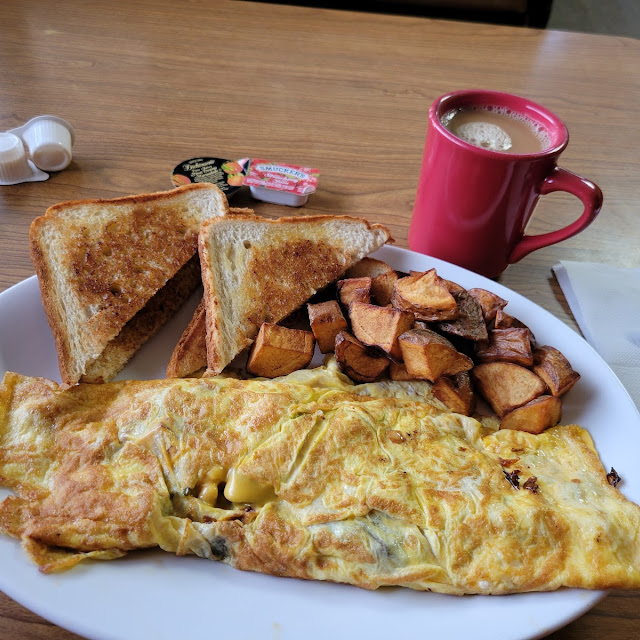 Western Omelet Home Fried Potatoes Wheat Toast and Coffee