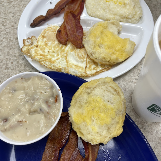 Sausage Gravy and Biscuit with Bacon and Eggs and Grits