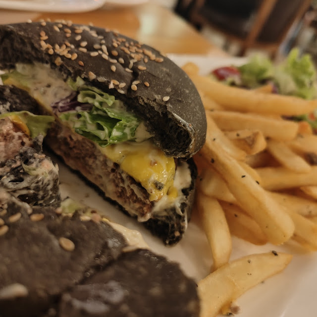 Classic Charcoal Bun Chicken Burger Served with Steak Fries