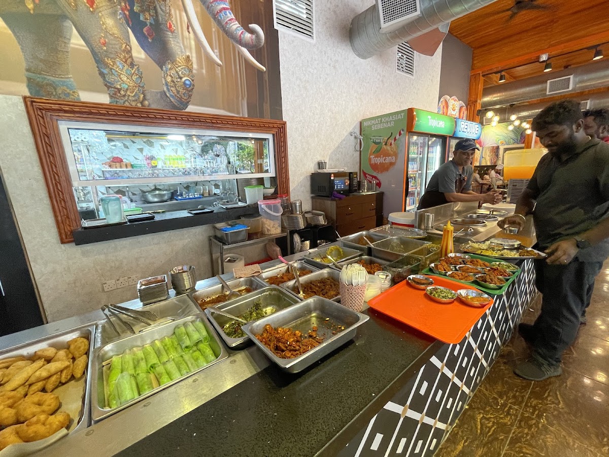 Dhivya's Cafe and Souveniers - Photo 5