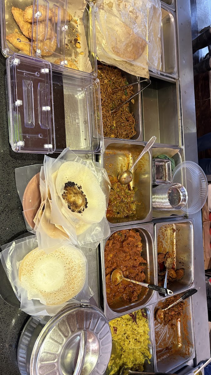 Dhivya's Cafe and Souveniers - Photo 7