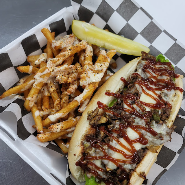 Philly Cheesesteak with Pickles and Barbecuesauce and Cajun Ranch Fries