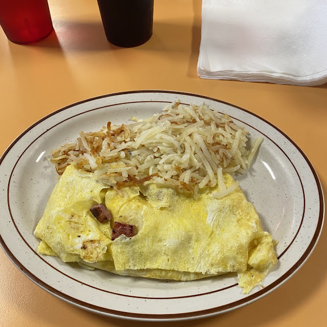 Eggs Grits and Corned Beef Hash