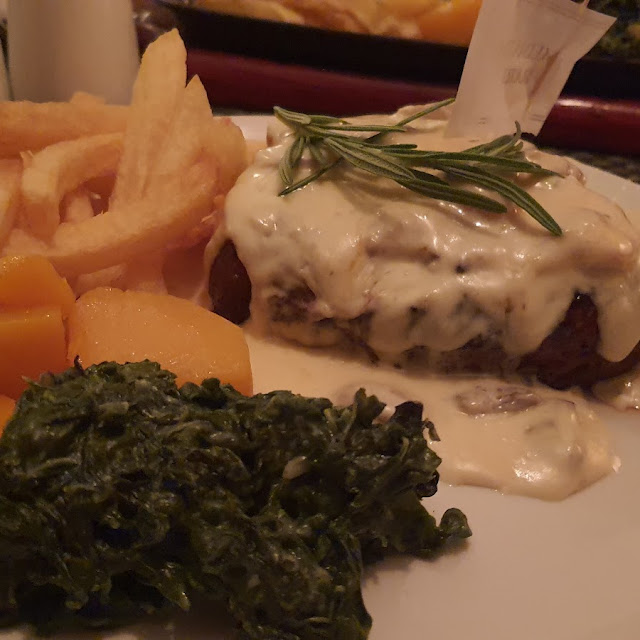 Rump Steak Topped with Mussels Shrimps and Garlic Sauce -Rump