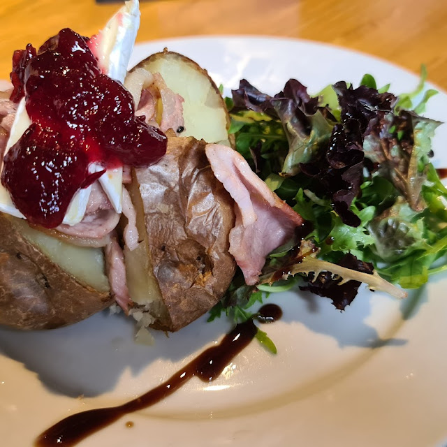 Baked Potato with Bacon Brie and Cranberry Sauce