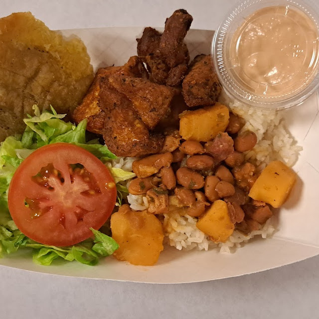 Carne Frita Tostones Y Ensalada Fried Chunks of Pork with Fried Plantains and Salad