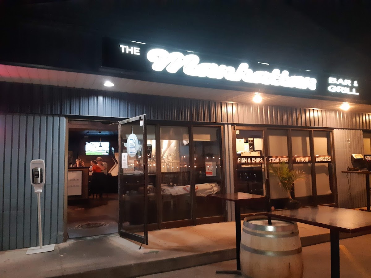 Manhattan Bar & Grill - Photo 1