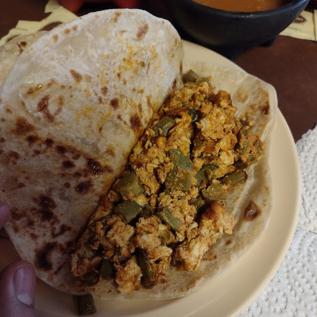 Barbacoa Taco on the Left
