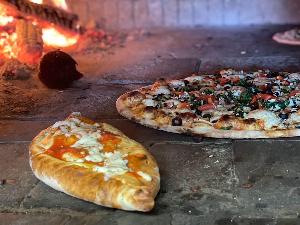 Dino's Wood Burning Pizza - Photo 1