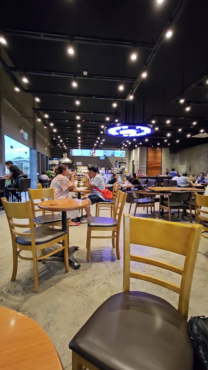 Tom N Toms Coffee Uptown - Photo 1
