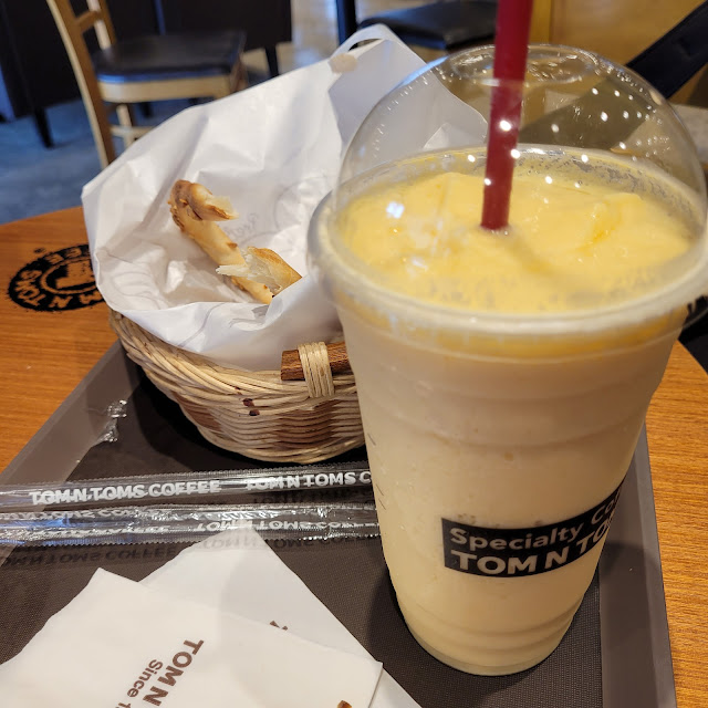 Half Eaten Almond Pretzel & Smoothie