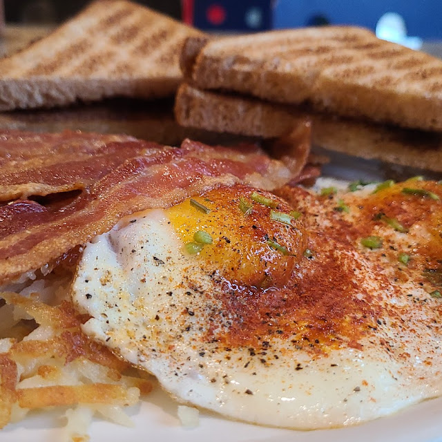 Fried Eggs Bacon and Cheese Sandwich