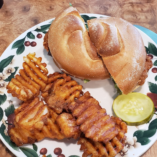Chick Sandwich with Lettuce and Tomato Ona Roll with Waffle Fries