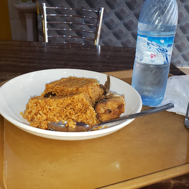Jollof Rice with Fish and Table Water
