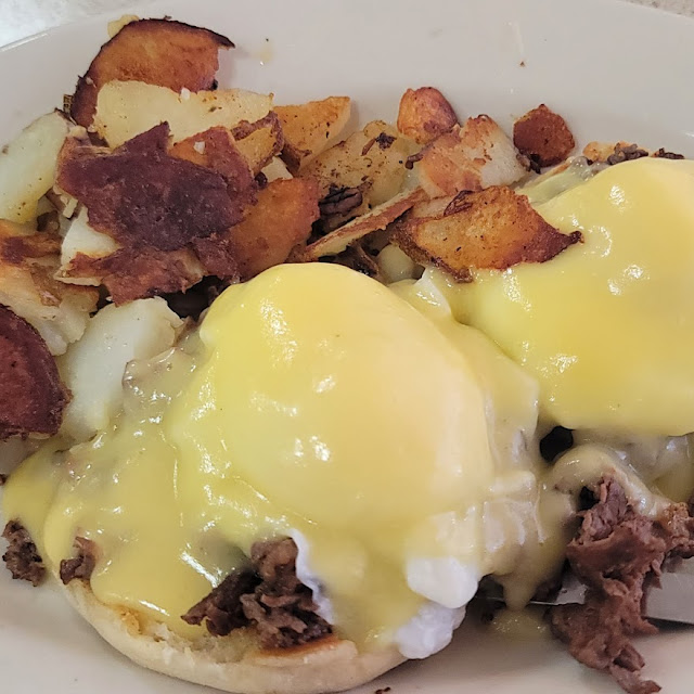 Eggs Benedict with Ribeye Steak and Home Fries
