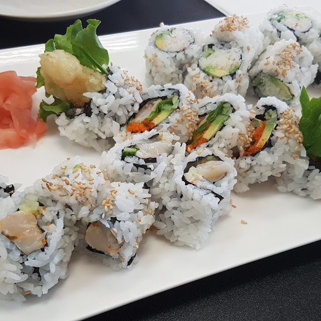 Chopped Scallop and Tobiko Roll Dynamite Roll California Roll