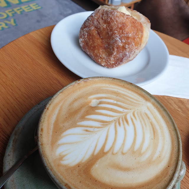 Flat White Coffee and Cream Doughnut