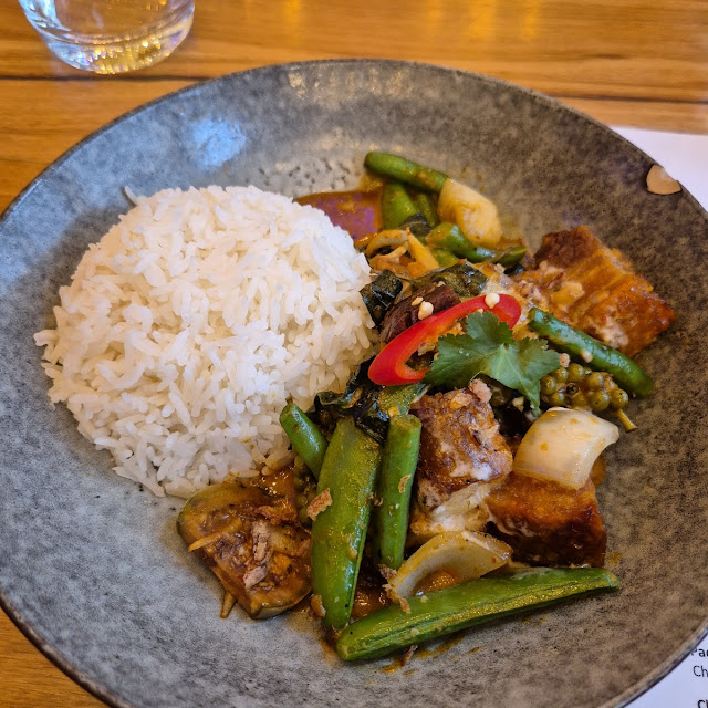 Crispy Pork Belly with Thai Basil Wild Ginger Eggplant on Rice
