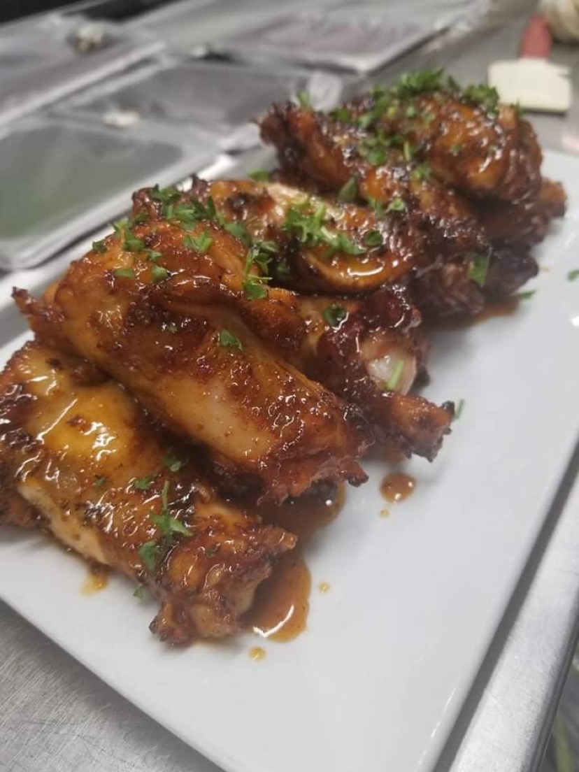 Banded Rooster Bar & Grill - Photo 1