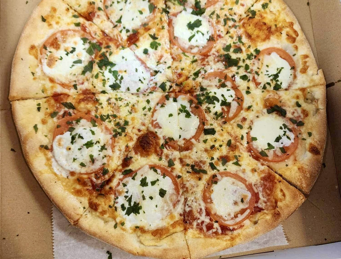 Crispy Crust Pizzeria - Photo 1