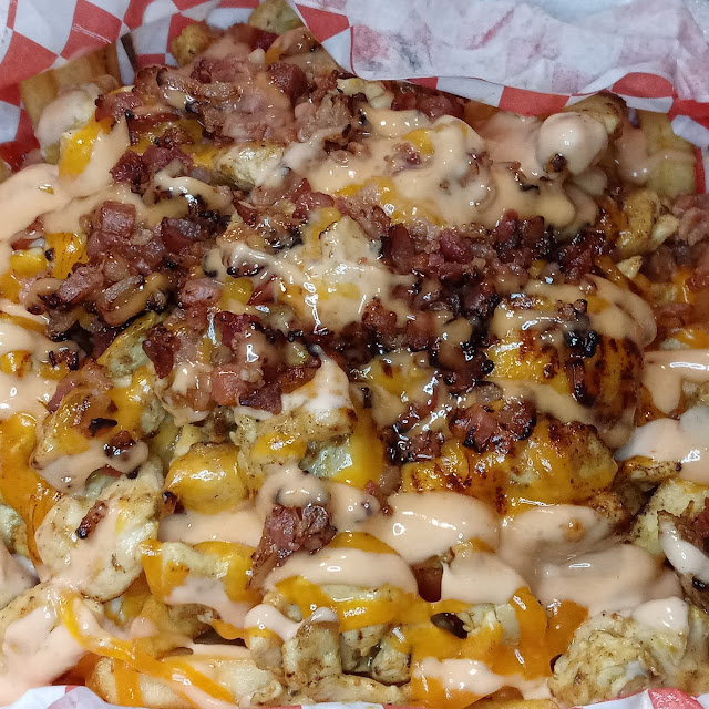 French Fries with Chicken and Cheese