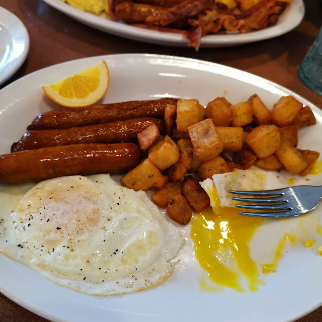 Eggs Sausage Hashbrowns & an Orange