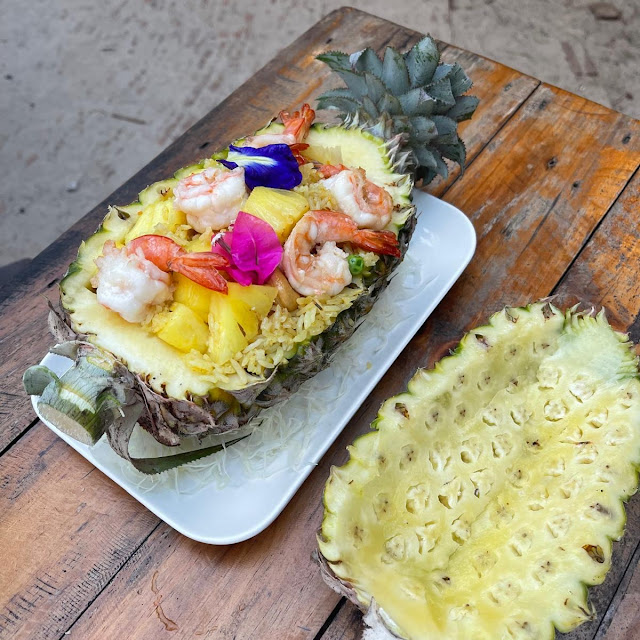 Baked Rice with Shrimps and Vegetable Serves in Pineapple
