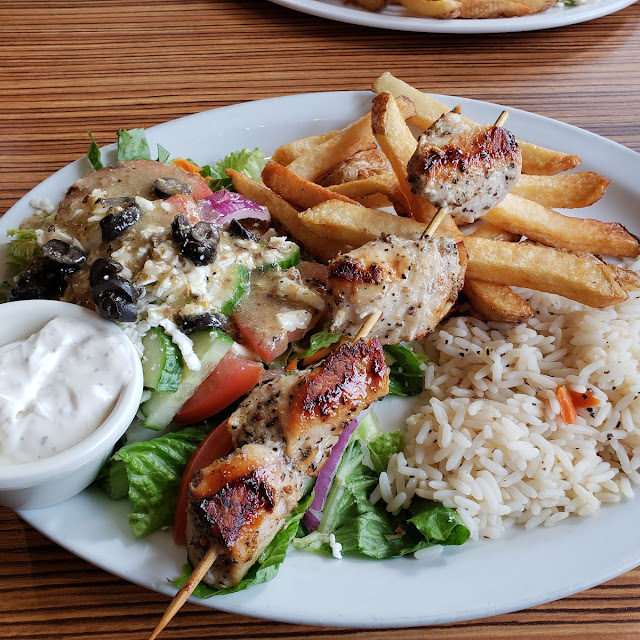 Chicken Souvlaki on a Pita with Tzatziki Rice and Greek Salad