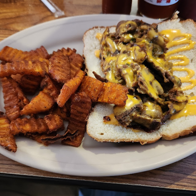 Philly Cheese Steak Sandwich and Sweet Potato Fries