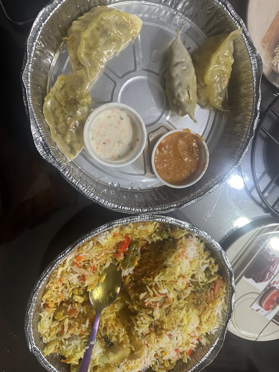 Momos & Grill - Photo 1