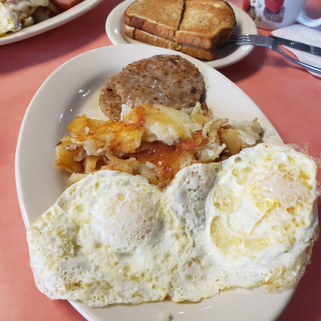 Eggs Sausage Patties Home Fries and Toast