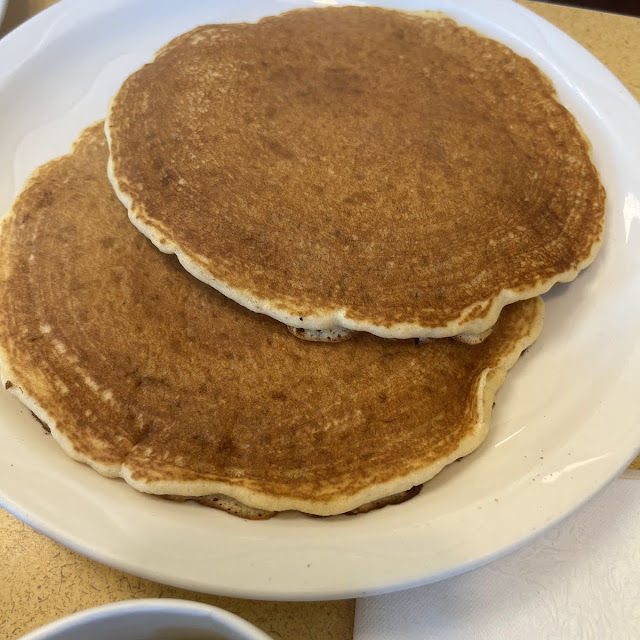 2 Pecan Pancakes 2 Eggs 2 Bacon 2 Drinks