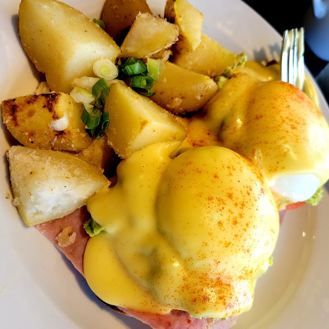 Eggs Benedict with a Side of Hash Browns