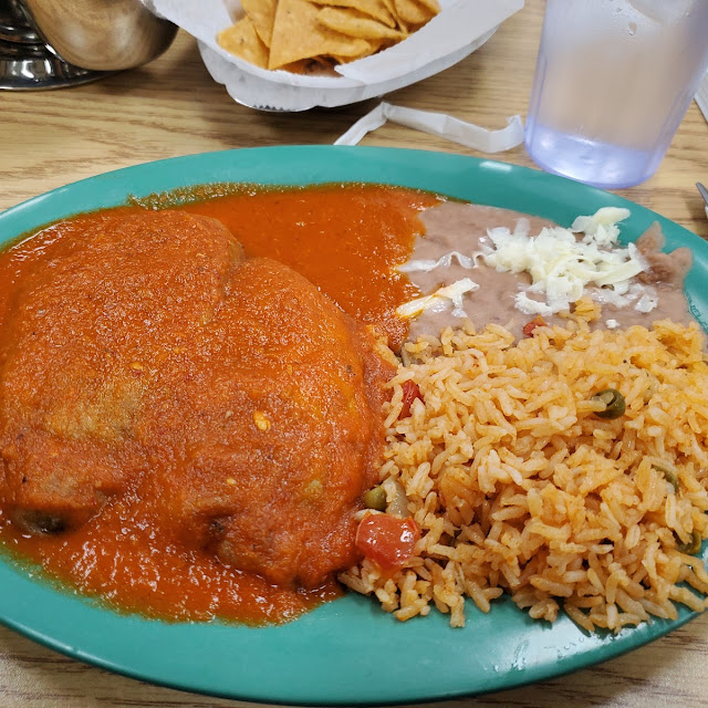 Chiles Rellenos En Salsa Roja Mexican Poblado Pepper Stuffed with Cheese on Red Sauce