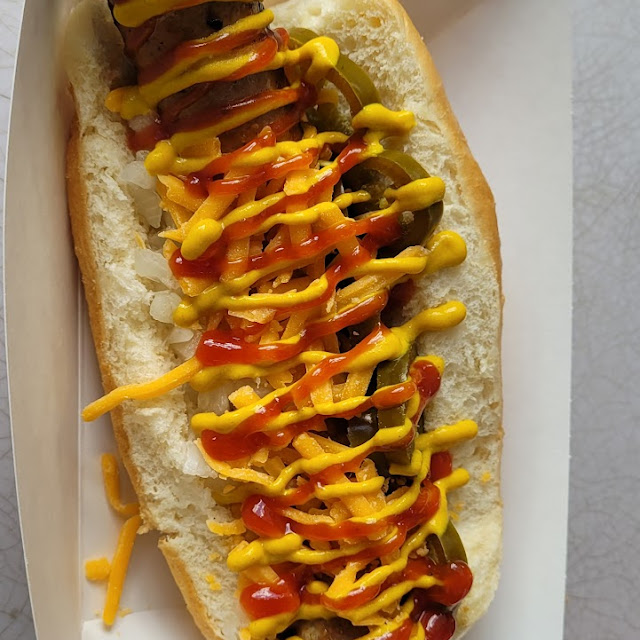 Hot Dog with Saurkraut and Chopped Onion