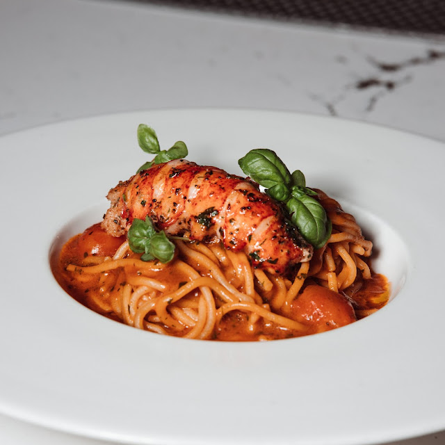 Spaghetti Au Lobster Bisque Reduction Poached Lobster Tail Cherry Tomatoes