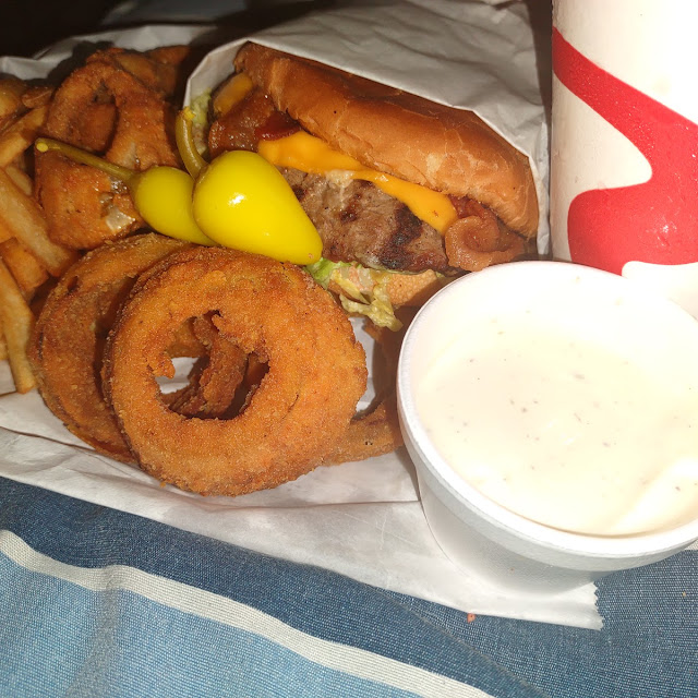 Double Bacon Cheeseburger Combo with Fries Onion Rings and Bananas Peppers