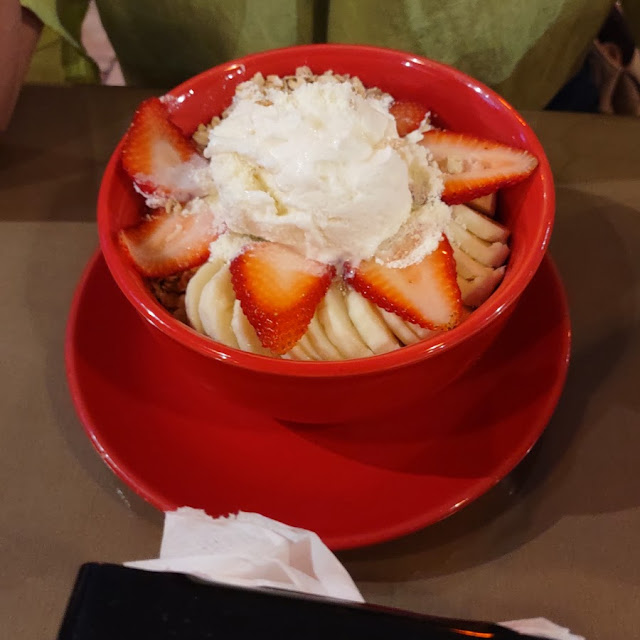 Acai Bowl with Banana Strawberries Granola Coconut Ice Cream Condensed Milk and Powder Milk