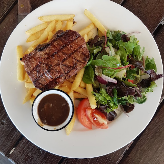 Medium Rare Steak Chips and Salad Gravy on the Side