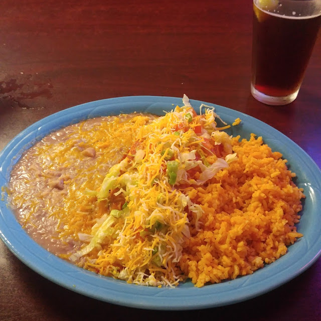 2 Enchiladas and Rice and Beans