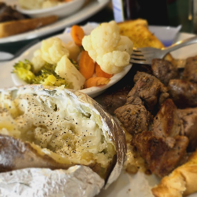Steak Tips Special Baked Potato and California Mix Veggies